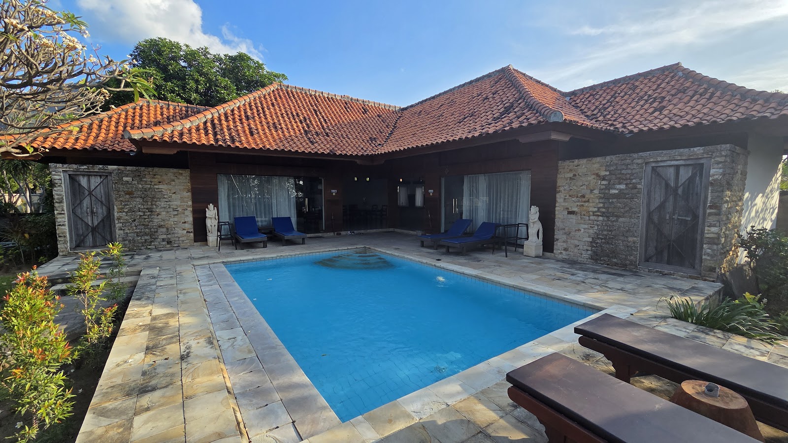 Private villa pool with tiled roof bungalows in Pemuteran