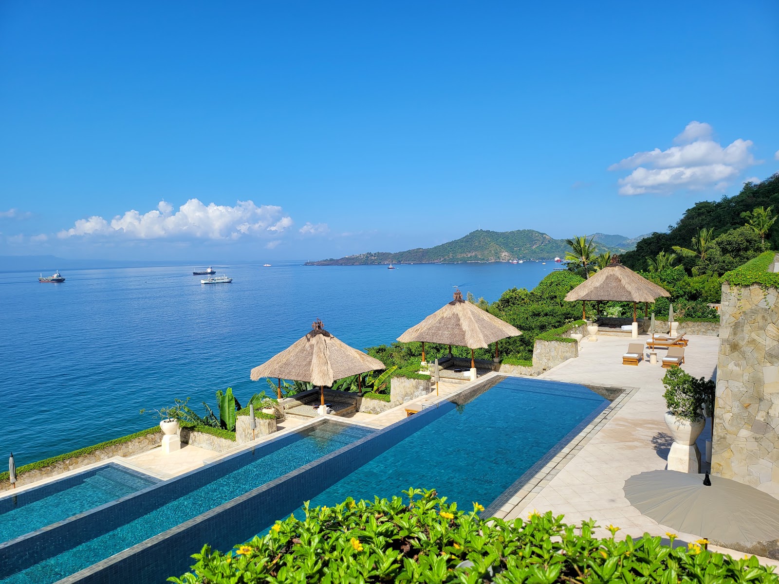 Amankila tiered infinity pools, one of the best family friendly hotels in East Bali