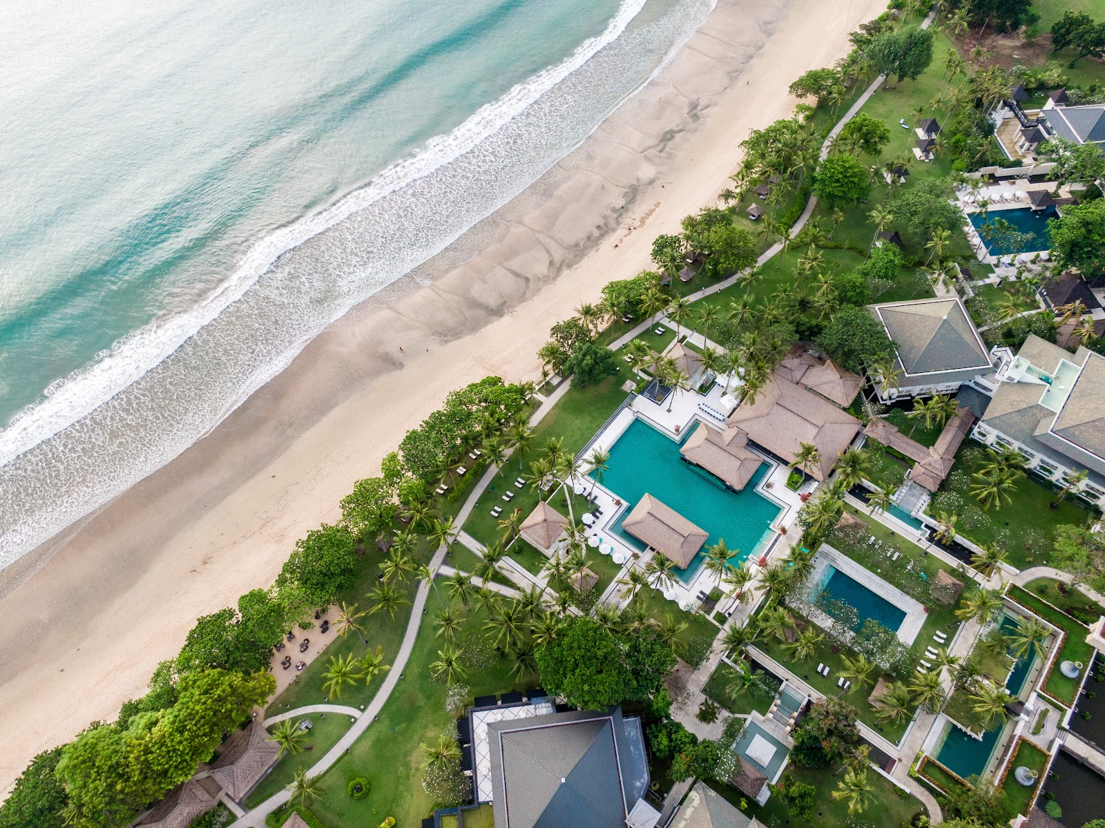 Aerial view of Jimbaran Bay, home to the best family friendly hotels in Jimbaran