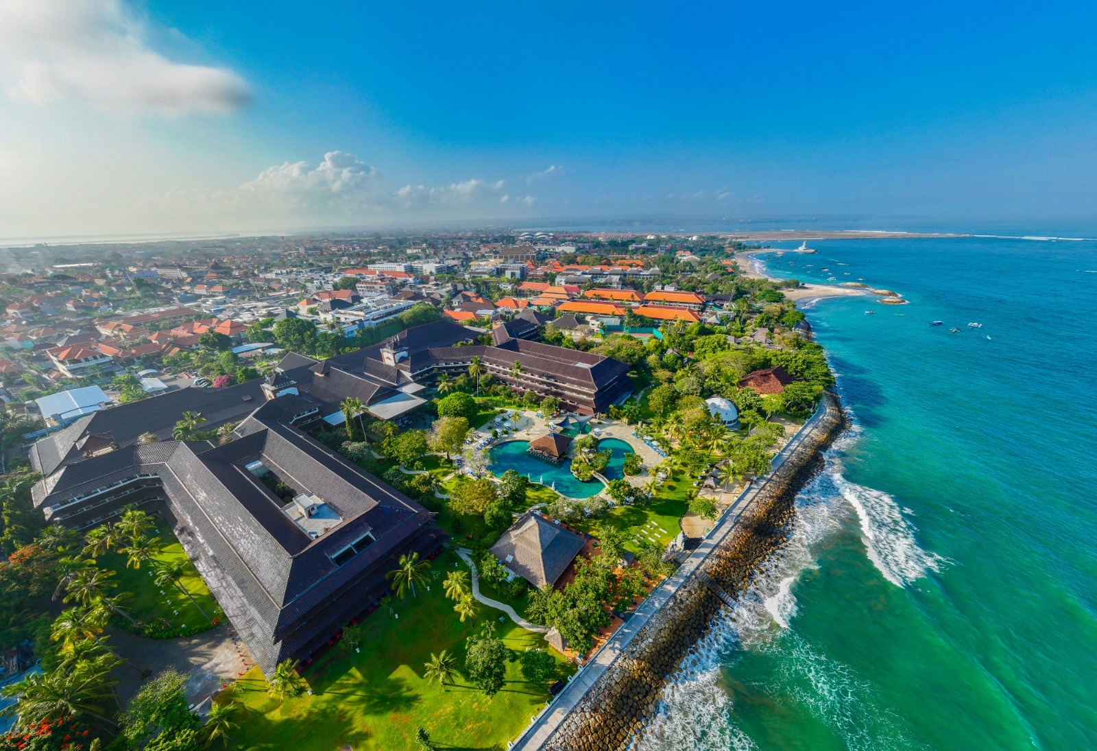Aerial view of the Kuta coastline, home to the best family friendly hotels in Kuta