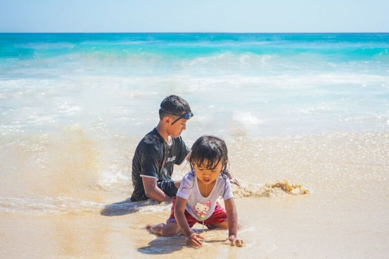 Kids playing in the sand, the perfect start to a stay at the best family friendly hotels in Sanur