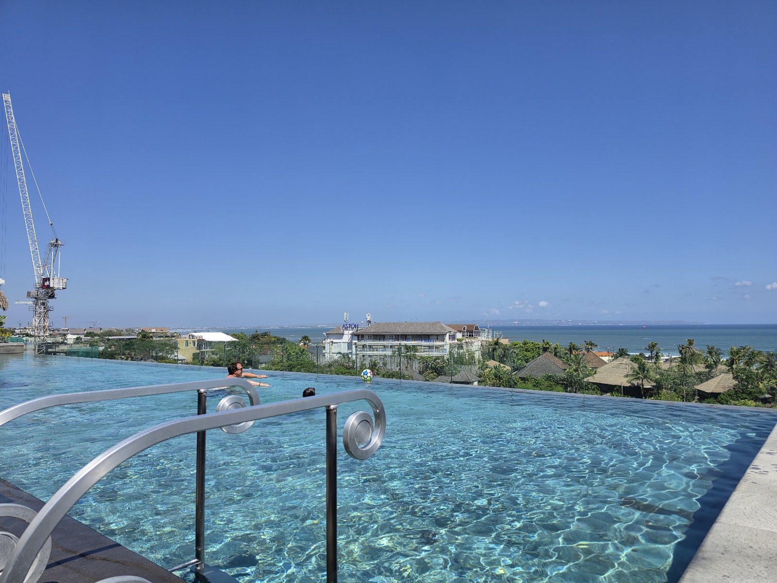 Rooftop infinity pool with ocean views at Holiday Inn Resort Bali Canggu