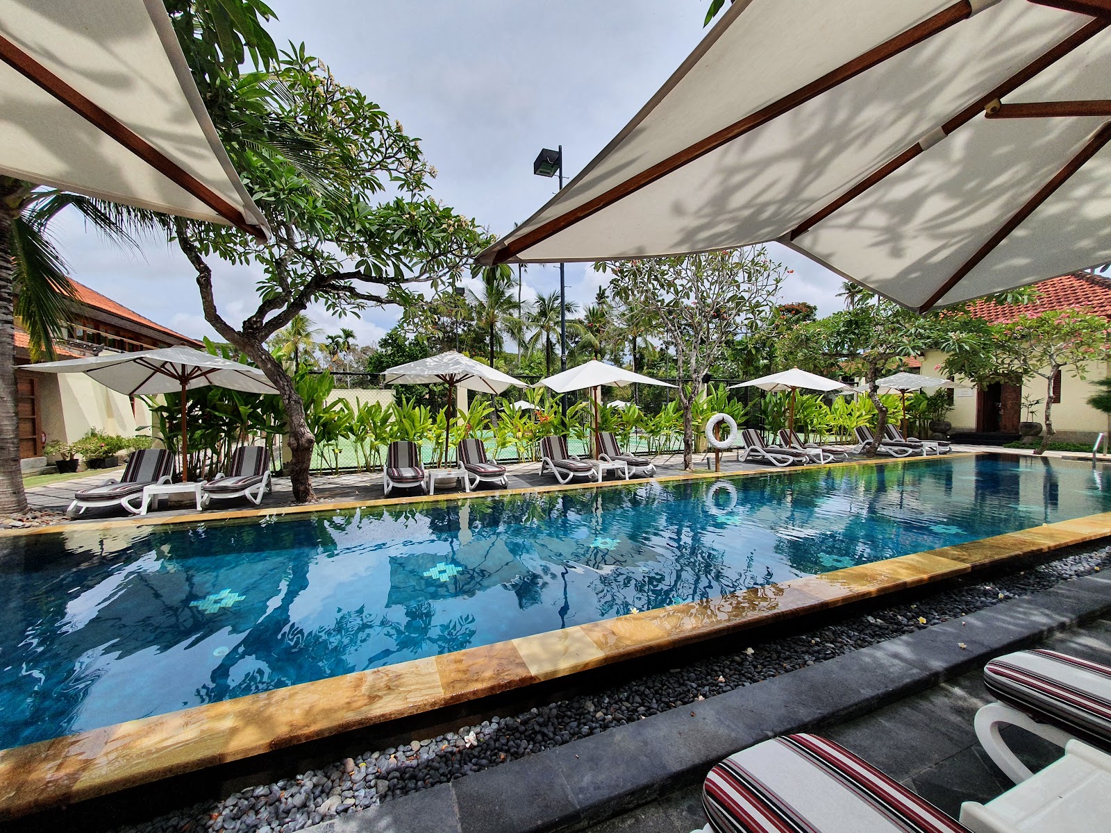 Pool surrounded by Balinese gardens at Nusa Dua Beach Hotel and Spa