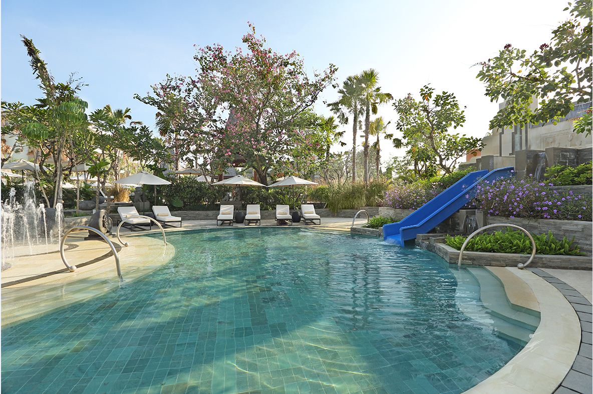 Sofitel Bali Nusa Dua pool with a waterslide, a family friendly hotel in Nusa Dua
