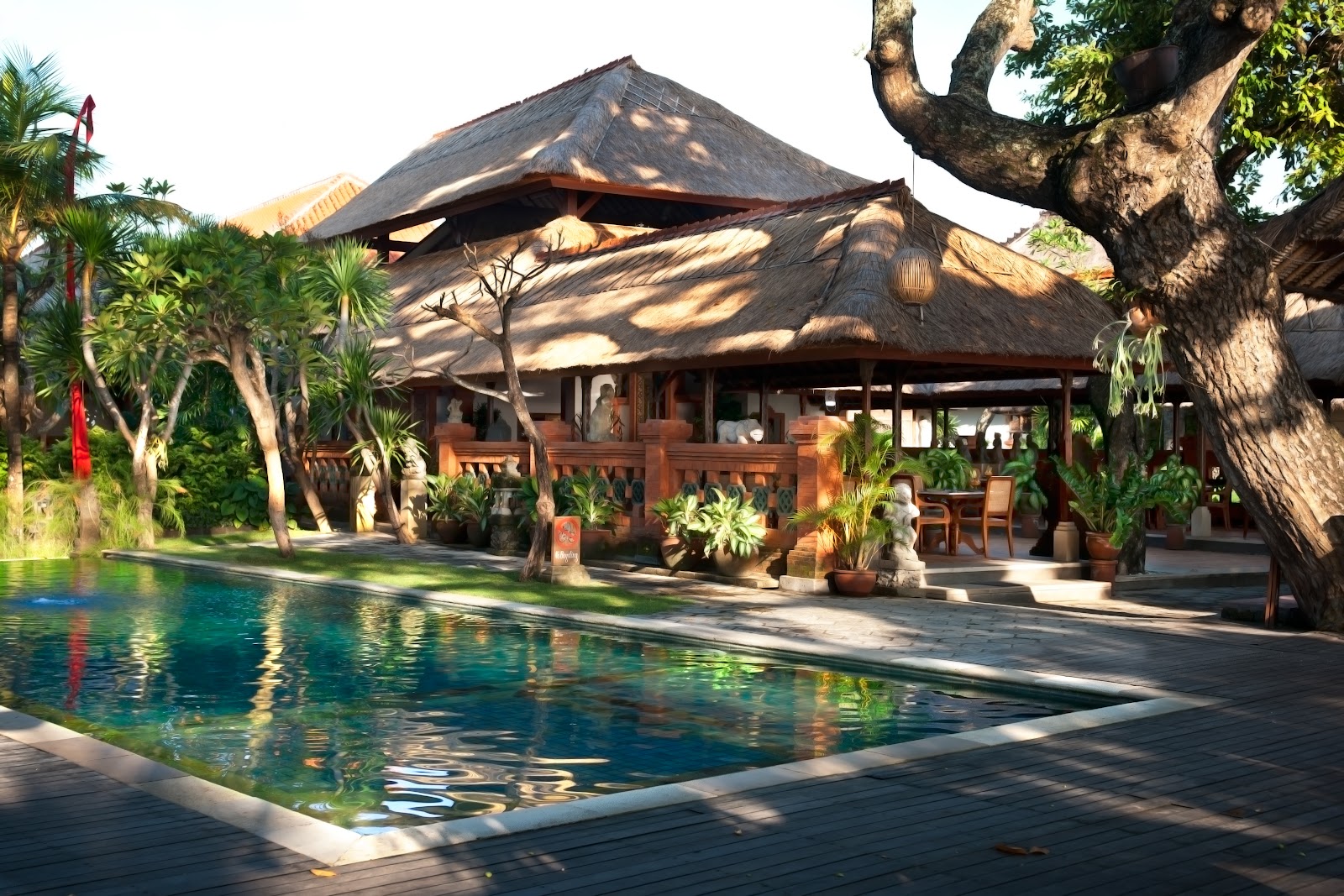 Pool surrounded by tropical gardens at Tandjung Sari Hotel