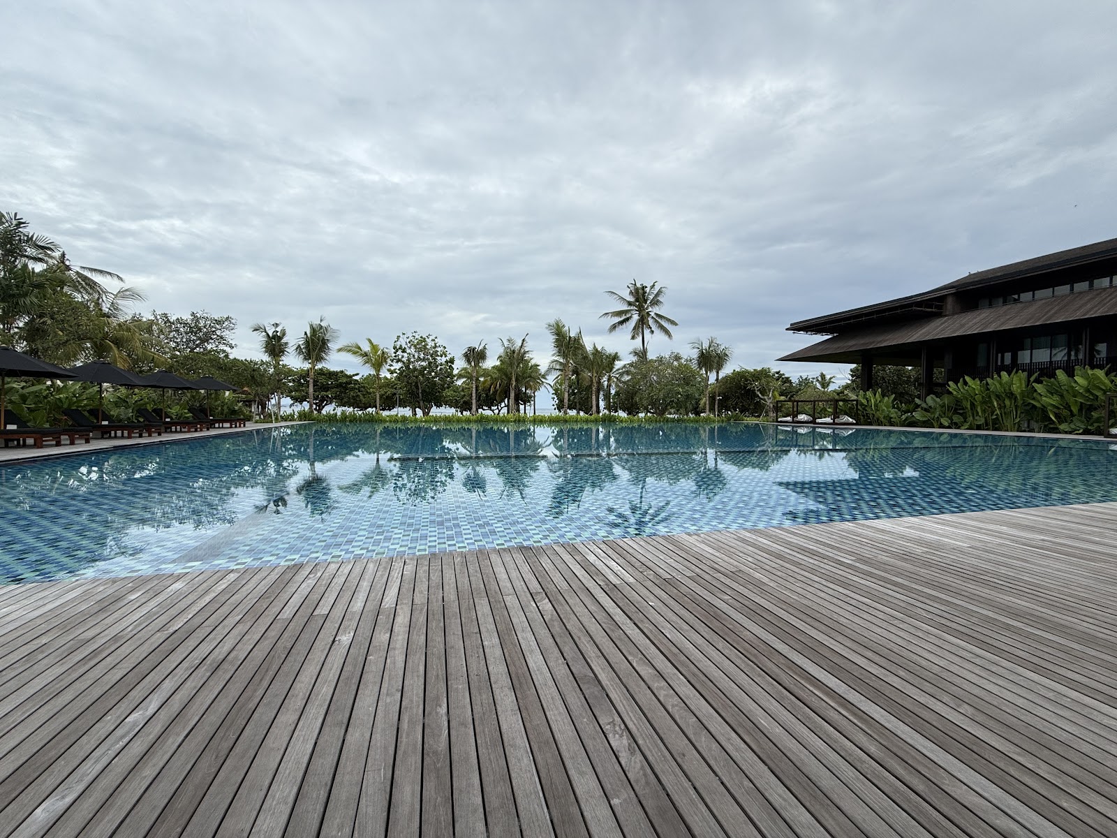 Expansive pool deck at The Meru Sanur