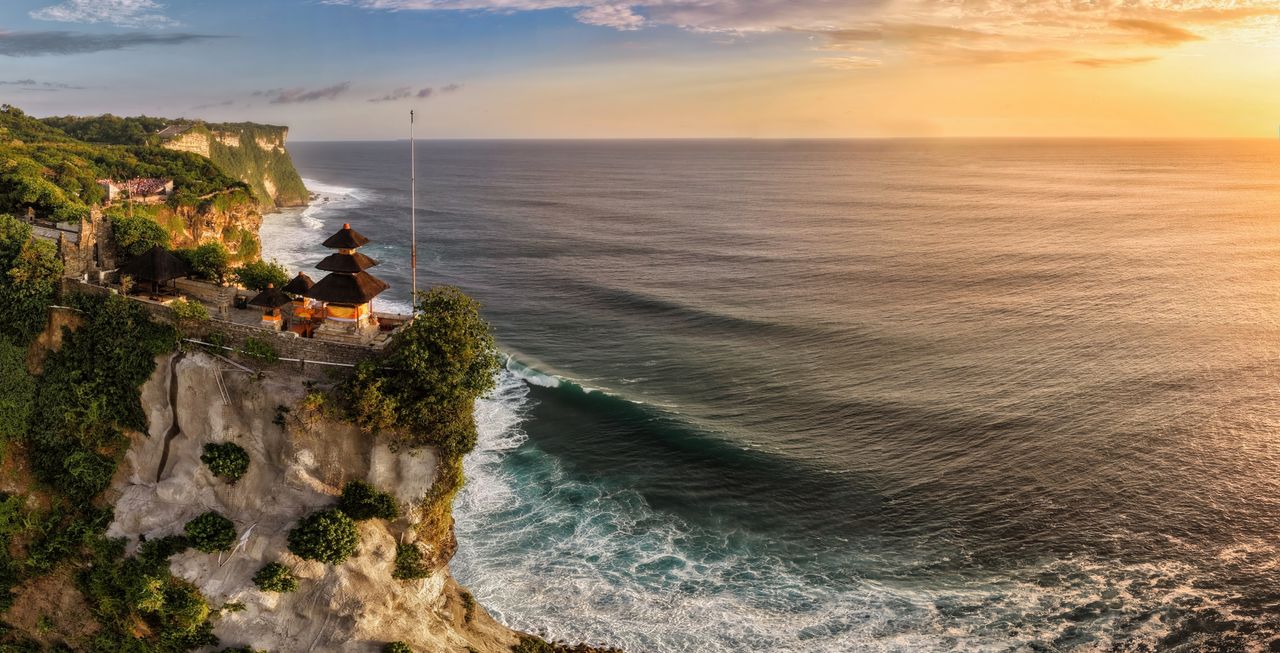 Uluwatu Temple perched on the cliffs at sunset