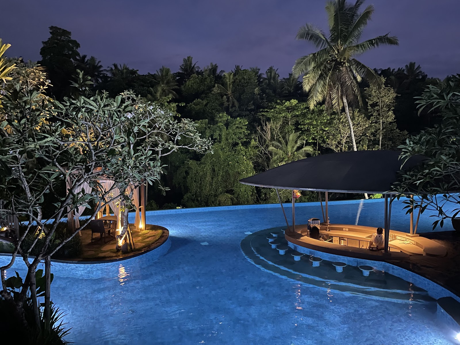 Swimming pool surrounded by gardens at The Westin Resort and Spa Ubud